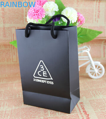 कॉटन हैंडल टी पैकेजिंग बैग के साथ कस्टम डिज़ाइन किए गए ग्रीन क्राफ्ट पेपर बैग