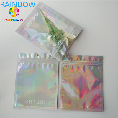 स्पष्ट रूप से सामने / पीछे होलोग्राफिक के साथ चमकदार लेजर कॉस्मेटिक पैकेजिंग बैग