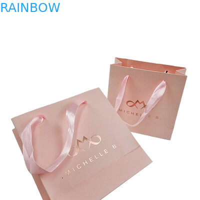 कस्टम प्रिंट लोगो सुरुचिपूर्ण सफेद काले उपहार कागज बैग लक्जरी कपड़े बुटीक कागज शॉपिंग बैग रिबन हैंडल के साथ