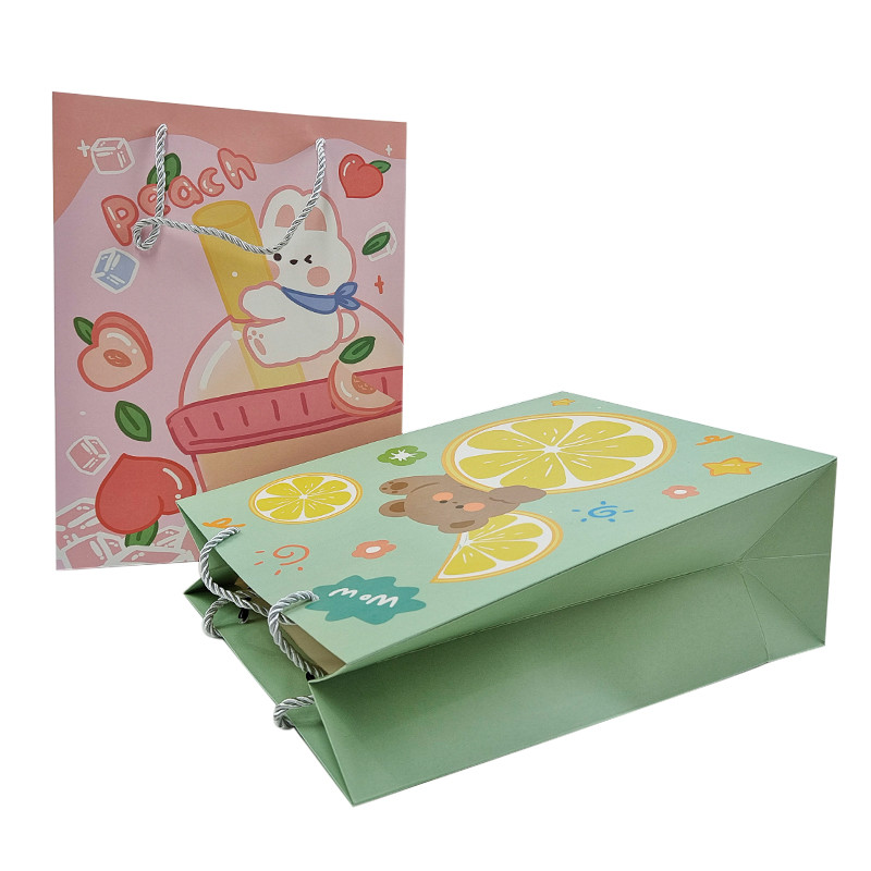 थोक कस्टम मुद्रित लोगो लक्जरी उपहार कागज बैग खुदरा बुटीक खरीदारी कागज बैग